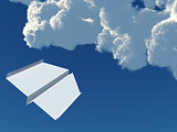 paper airplane on a background blue sky and clouds