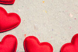 red hearts on vintage  paper background with copyspace
