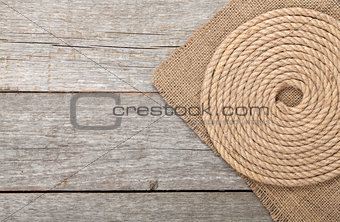Ship rope on wood and burlap