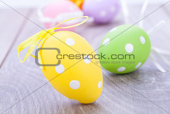 colorful easter egg decoration on wooden background