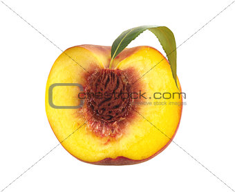 Half of fresh sweet peach with green leaf isolated on white back