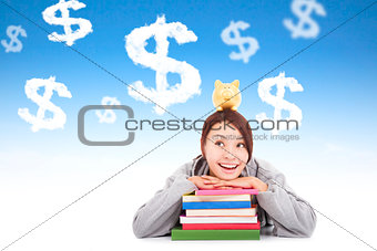 smiling young student thinking to earn money  with books 