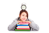 happy young student thinking  clock with books  