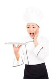 unbelievable asian woman chef holding tray