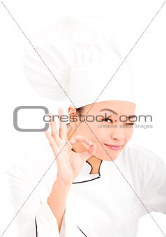 Asian chef baker or cook showing ok hand sign