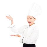 young graceful woman dressed as a cook with cap