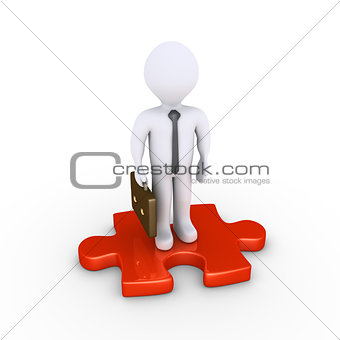 Businessman standing on puzzle piece