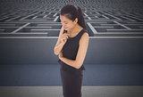Composite image of thoughtful businesswoman