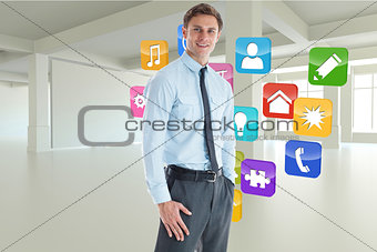 Composite image of smiling businessman standing with hand in pocket