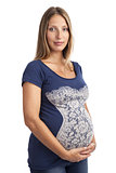 Young pregnant woman over white background