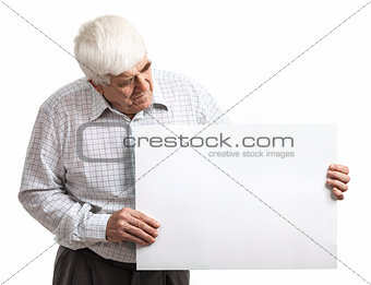 Mature man holding a blank billboard isolated on white background