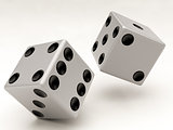 two white dices falling