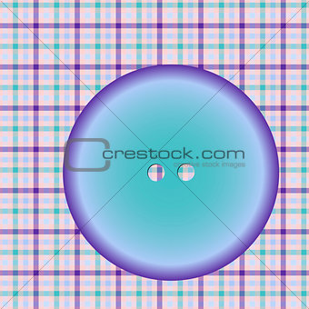 round button on a checkered cloth surface