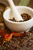 Mortar & pestle with pepper and chili