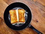 Grilled cheese sandwich on skillet