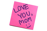 Sticky note with text "love you mom"