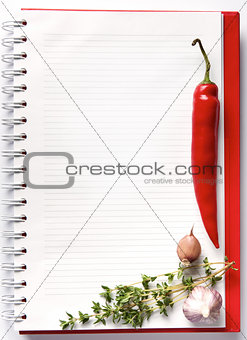 Blank notebook with fresh vegetables