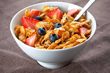 Bowl of corn flakes and berries