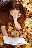 young female reading book