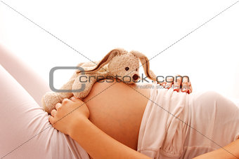 pregnant woman on a white background