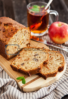 Apple nut cake on wooden board