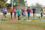 Instructor Exercising with Group