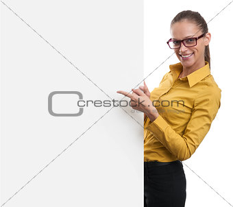 Woman pointing at a blank board