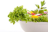 fresh tasty mixed salad with different vegetables isolated