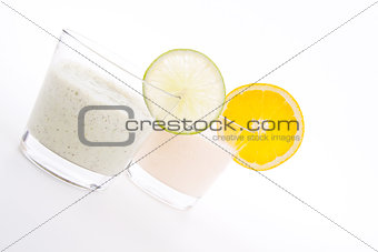 fresh tasty lime and orange yoghurt shake cream isolated