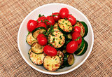 Fried zucchini and tomatoes