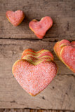 Heart shaped cookies on a wooden background
