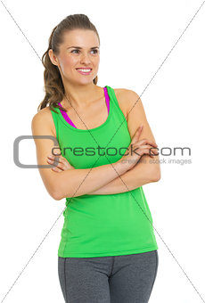 Fitness young woman looking on copy space