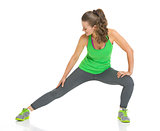 Fitness young woman stretching