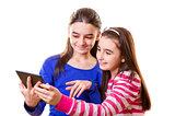 Happy teen girls with digital tablet