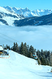 Winter sunny mountain and ski lift