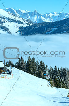 Winter sunny mountain and ski lift