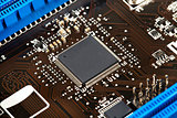 Laptop microchip on motherboard closeup