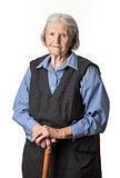 Portrait of a calm senior woman looking at the camera. Over white background.