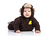 Baby boy dressed in monkey costume over white