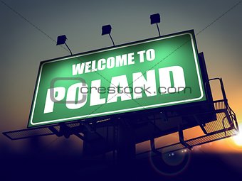 Billboard Welcome to Poland at Sunrise.
