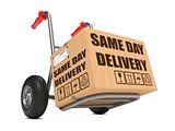 Same Day Delivery - Cardboard Box on Hand Truck.