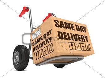 Same Day Delivery - Cardboard Box on Hand Truck.