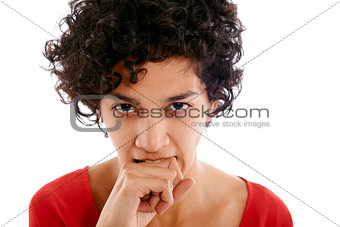 envious hispanic woman biting finger