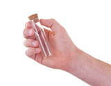 Empty chemical test tube in a hand