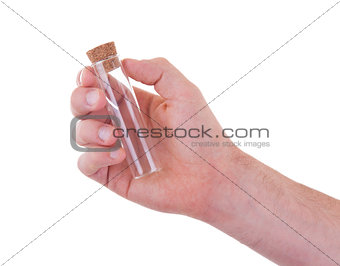 Empty chemical test tube in a hand