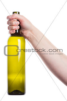 Wine bottle in the hand  