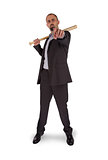 Portrait of angry businessman holding baseball bat
