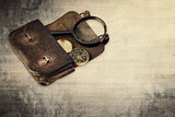 Vintage background , wallet and compass