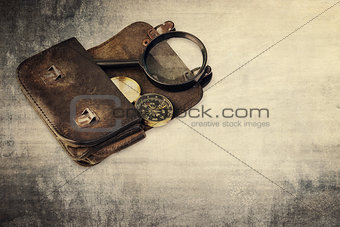 Vintage background , wallet and compass