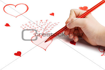 Child's hand drawing Saint Valentine card with hearts 